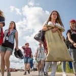 Russian girls walking toward the festival entrance.