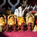 Gold-colored Buddhist souvenirs on sale inside the Datsan complex.