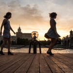 Practicing tap dance at sunset on the Moscow River.
