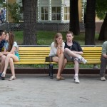 Russians sitting near Patriarchy Pond in the historical centre of Moscow.