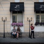 Young Russians hanging out in front of a new restaurant in the centre of Moscow.