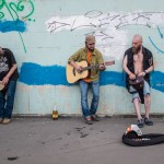 Russian street musicians playing outside a metro station.