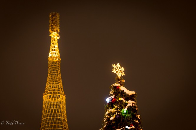 The Soviet-era Shukov radio tower literally 'towers' over this Christmas tree near the center of Moscow. 