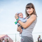 Svetlana, 27, was holding her one-month old son at Nashestvie. She said she has been coming to the music event for six years.