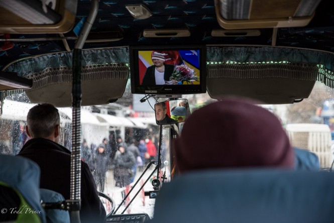 Russian comedians perform on the TV in this bus to Tiraspol. 