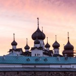 The Monastery's cupolas at dusk during White Night season.