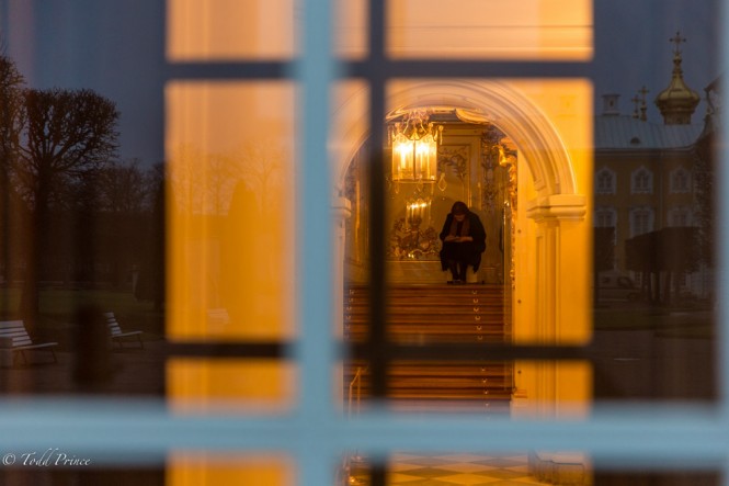 A Peterhof worker reading a book on a very slow Friday evening. 