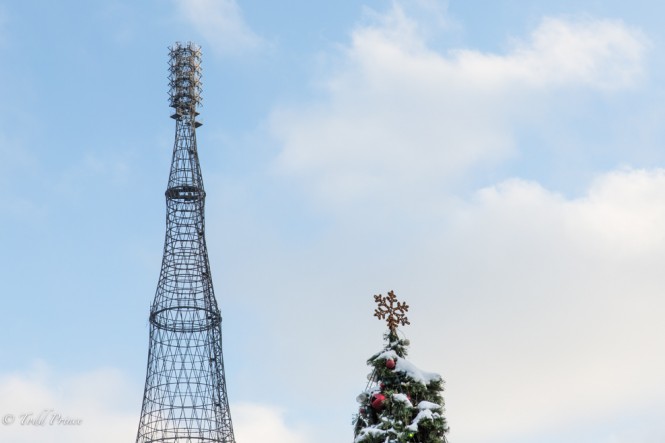 The Soviet-era Shukov radio tower rises above a Christmas tree near central Moscow.