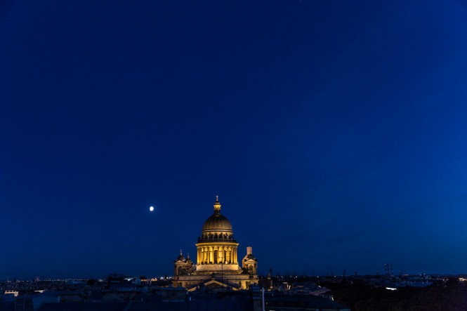 The Moon over St. Isaac's Cathedral in St. Petersburg. 
