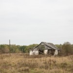 An abandoned home in Troitskoe village.